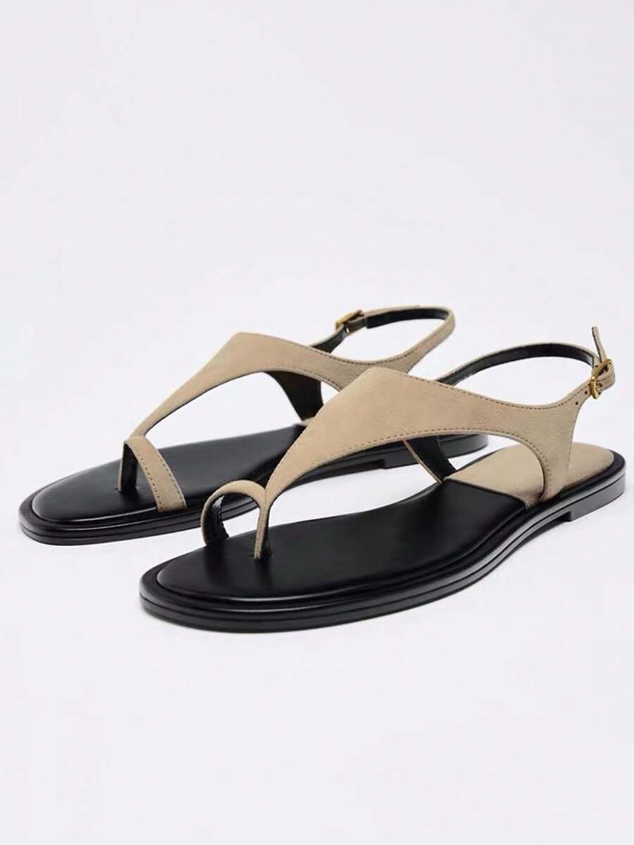 Sandal đế bằng tối giản dành cho nữ, có quai ngang mắt cá chân và lỗ xỏ ngón, kiểu dáng khoét rỗng, thích hợp cho phong cách thường ngày. - Màu be - Xem 1