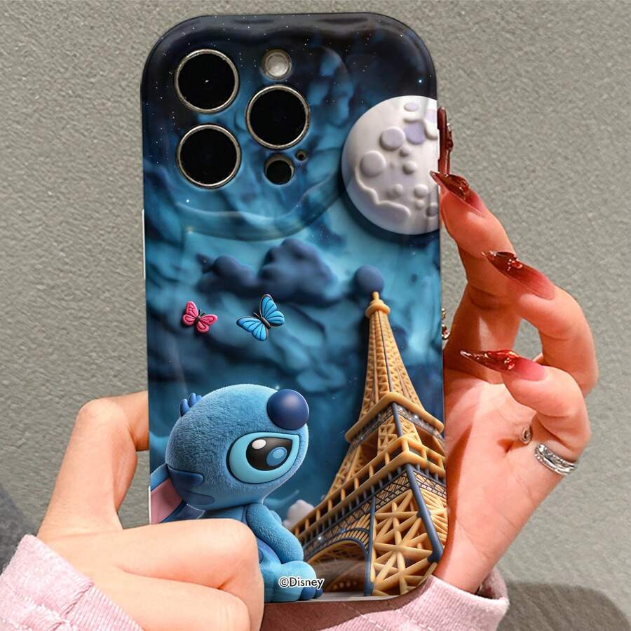 Disney Lilo & Stitch Stitch Phone Case – Plush-Style Stitch Sitting Beside The Eiffel Tower, With Moon, Clouds & Butterfly Accents On Dark Blue Night Sky Background, Shockproof Protective Cover For IPhone 17, 16, 15, 14, 13, 12, And 11 Pro Models.. A Fun Gift For Family, Friends, Birthdays, Holidays, And Special Occasions. - trắng - Xem 1