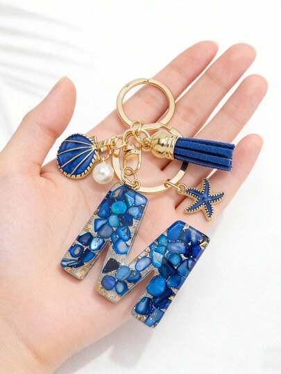 1 Móc khóa nhựa phong cách Boho hàng hải 26 chữ cái - Mặt dây chuyền chữ cái màu xanh dương và vàng với hình sao biển/vỏ sò/dây tua rua, móc khóa thời trang và phụ kiện trang trí túi xách/ba lô/túi đi biển cho cặp đôi, quà tặng lý tưởng cho ngày lễ Tình nhân/sinh nhật/tiệc tùng.