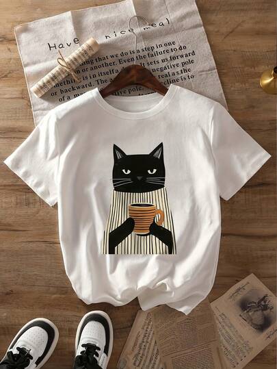 Printed Round Neck Short Sleeve Casual T-Shirt For Women, Featuring A Black Cat Wearing A Striped Turtleneck Sweater Holding An Orange And Black Striped Coffee Cup, Creating A Relaxed Slow-Paced Lifestyle, Suitable For Spring, Summer, Autumn, Back To School, Vacation, Spring Outfit, Club Wear White