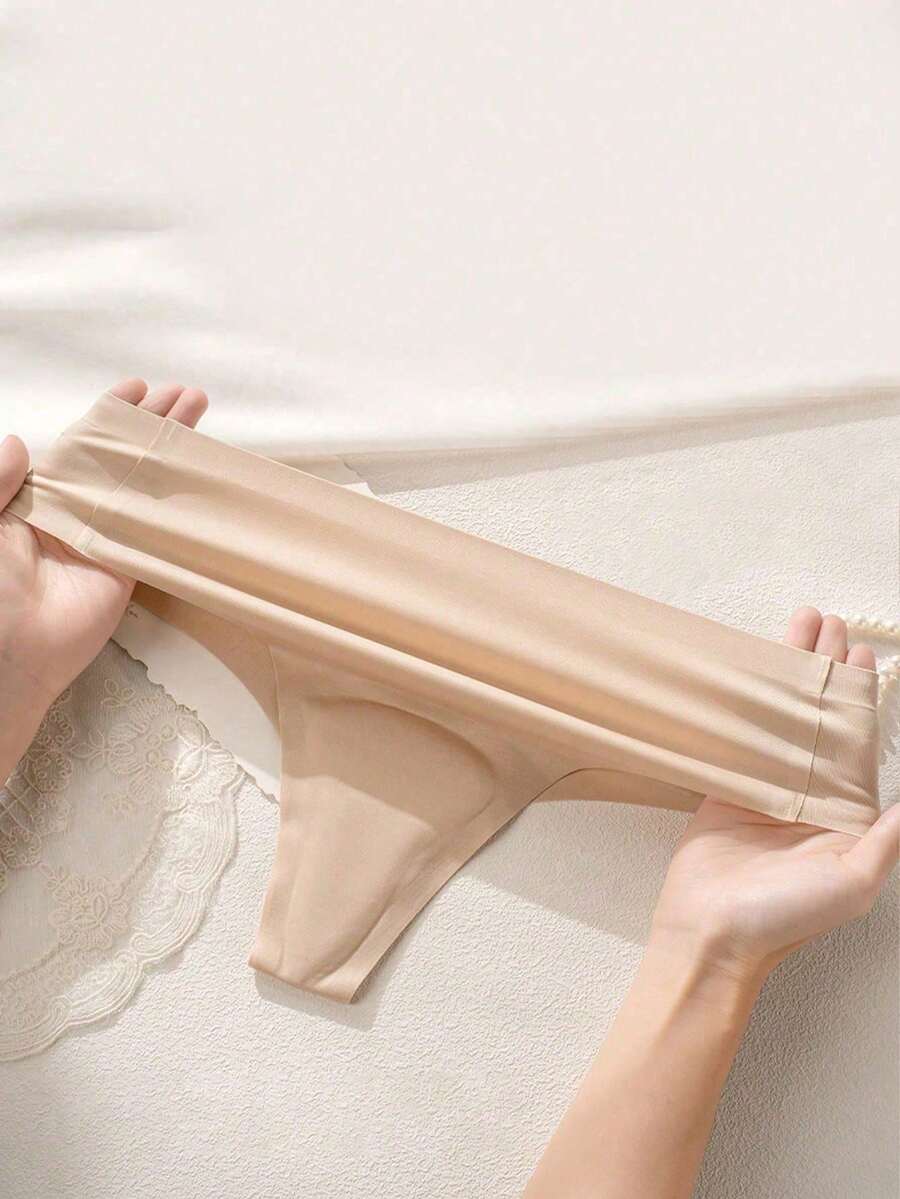 1 chiếc quần yoga nữ có miếng lót tàng hình, quần tam giác đáy quần không đường may bằng latex, đồ lót thể thao. - Rượu sâm banh - Xem 1