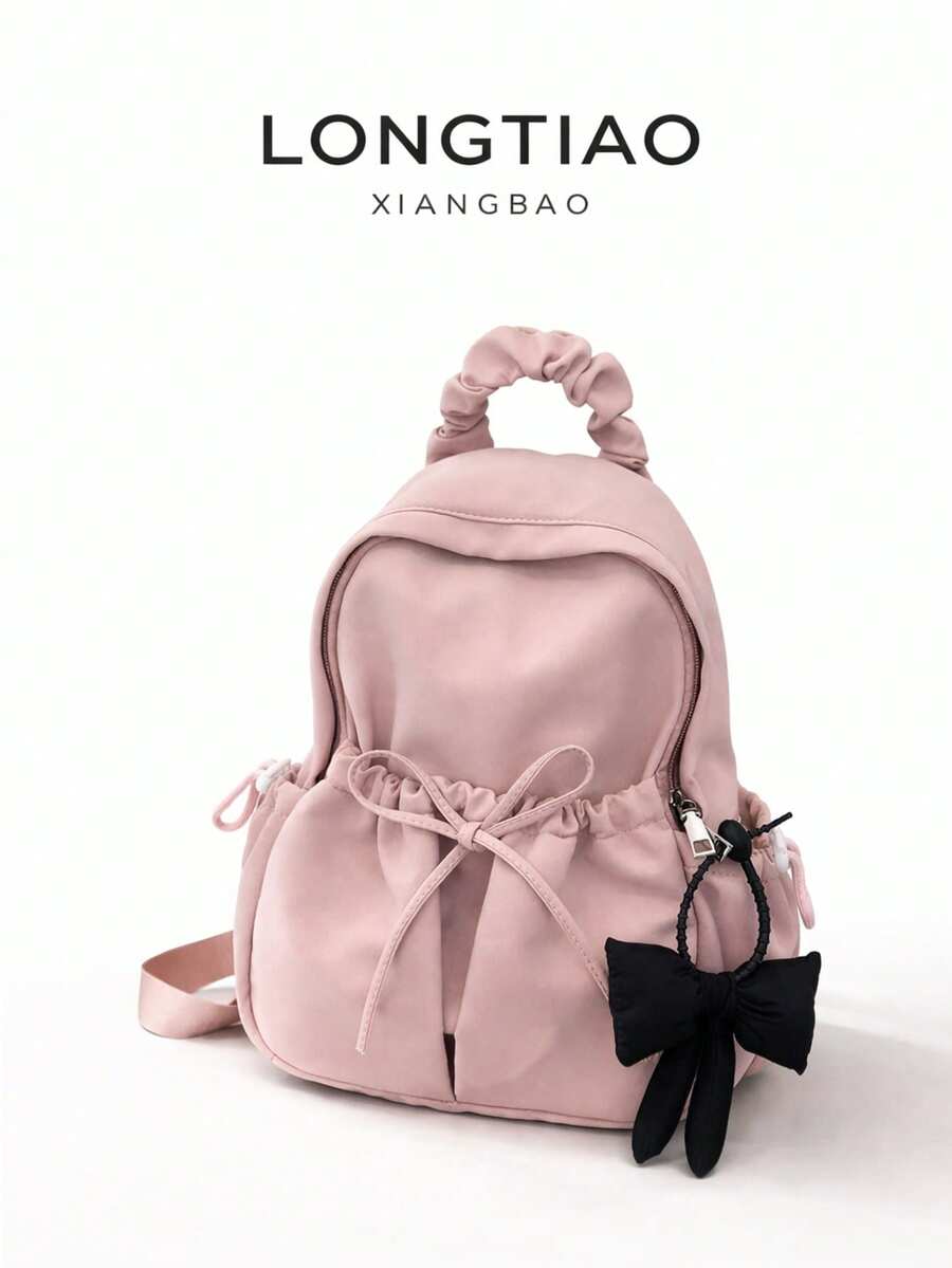 Ba lô dung tích lớn, trọng lượng nhẹ, trang trí hình bướm, đa năng dành cho học sinh, ba lô du lịch thường ngày với mặt dây chuyền hình bướm, bền chắc, dung tích lớn, dây đeo vai có thể điều chỉnh, phù hợp cho sinh viên tốt nghiệp, nữ sinh trung học, sinh viên năm nhất, năm hai, năm ba đại học, học sinh trung học, hoàn hảo cho các hoạt động ngoài trời, du lịch tựu trường, đeo đến trường, có thể phối hợp hoàn hảo với nhiều phụ kiện ba lô khác nhau, ba lô hình bướm dễ thương. - Hồng - Xem 1