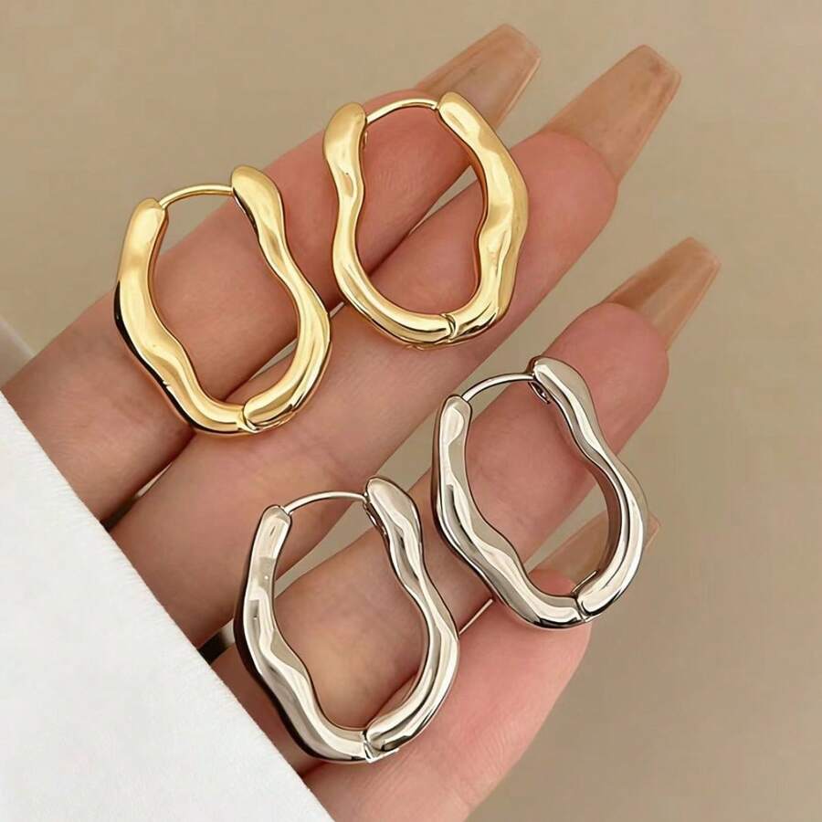 一对不对称几何耳环，线条流畅，简约设计，适合日常佩戴和轻度社交场合。 - 耳扣 - 查看 1