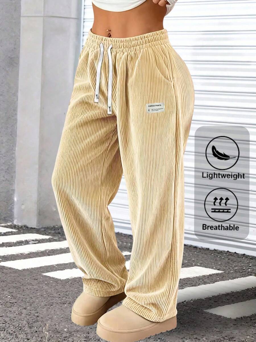 Quần dài nữ kiểu dáng thanh lịch, chất liệu nhung kẻ, màu trơn, có túi dây rút, thoáng khí và thoải mái, phù hợp cho các hoạt động hàng ngày, dã ngoại và du lịch mùa xuân. - Màu Khaki - Xem 1