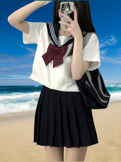 Bộ váy đồng phục thủy thủ màu trắng và đen, kiểu dáng dễ thương và ngây thơ theo phong cách học sinh Nhật Bản, tay ngắn và dài, thích hợp cho chụp ảnh kỷ niệm, tiệc tùng, cosplay và biểu diễn sân khấu.