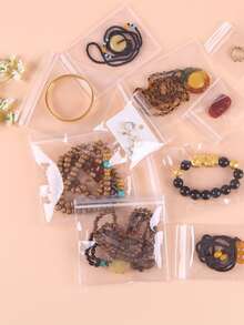 1-100个透明自封袋，珠宝袋，礼品包装袋，防水塑料珠宝收纳袋，适用于手镯、卡包、硬币、手镯、手表、项链、耳环、戒指和其他珠宝首饰 - 無色 - 查看 1