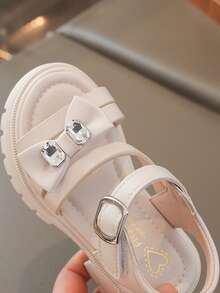 Giày sandal cho bé gái, giày La Mã đế dày thời trang mùa hè mới, giày công chúa hở mũi đính nơ đính đá, đế mềm đi biển. - Màu be - Xem 3
