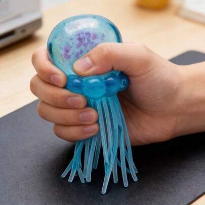 1pc New Creative Stress Relief Semi-Transparent Glowing Blue Jellyfish, Novelty Soothing Small Decor Ocean Theme Desktop Ornament, Firmly Graspable In Hand, Squeeze Toy, Mini Cute Squeezy Item, Classroom Reward, Perfect For Halloween And Christmas, Gift-Giving, Sensory Toy, Mini Stress Ball, Cute Design, Fun Aesthetics, Durable Squeezable Structure.