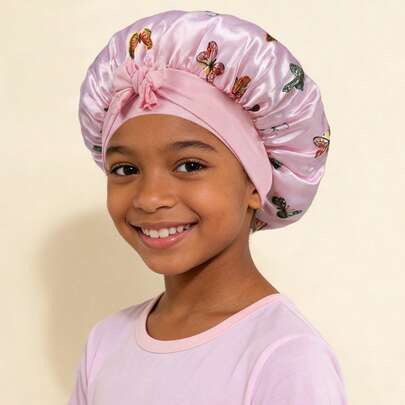 Awegeo 可爱缎面蝴蝶结儿童睡帽 - 透气、保护头发、可调节