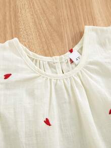 Bộ 2 món mùa hè cho bé gái, áo tay ngắn thêu hình trái tim, hàng mới về, gồm áo và quần short viền bèo nhún, thích hợp cho mùa hè. - Màu be - Xem 3