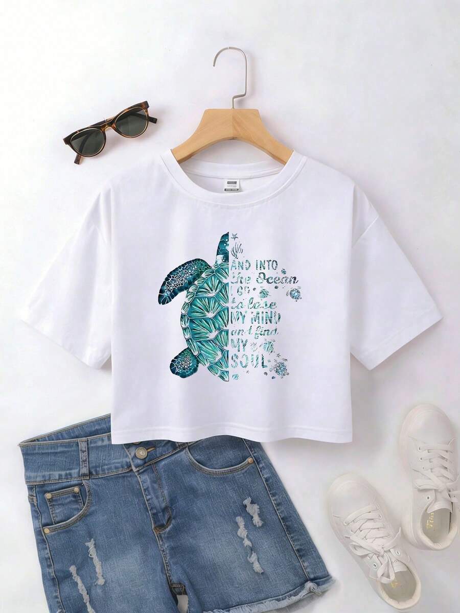 Women's 100% Cotton Cropped T-Shirt With A Midriff-Baring Cut And A Watercolor Print Featuring A Sea Turtle And An Ocean Quote. The Relaxed Cropped Cut Flatters The Figure And Elongates The Silhouette – Ideal For Everyday Wear, Outings, Casual Streetwear Looks, And Holidays. - 白色 - 查看 1