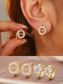 Bộ trang sức vàng 4 món, gồm bông tai hình bướm, trái tim và hình học đính đá Zirconia, không gây dị ứng, kiểu dáng thời trang thanh lịch, phù hợp để đeo hàng ngày và trong các dịp lễ hội. - Vàng - Xem 1