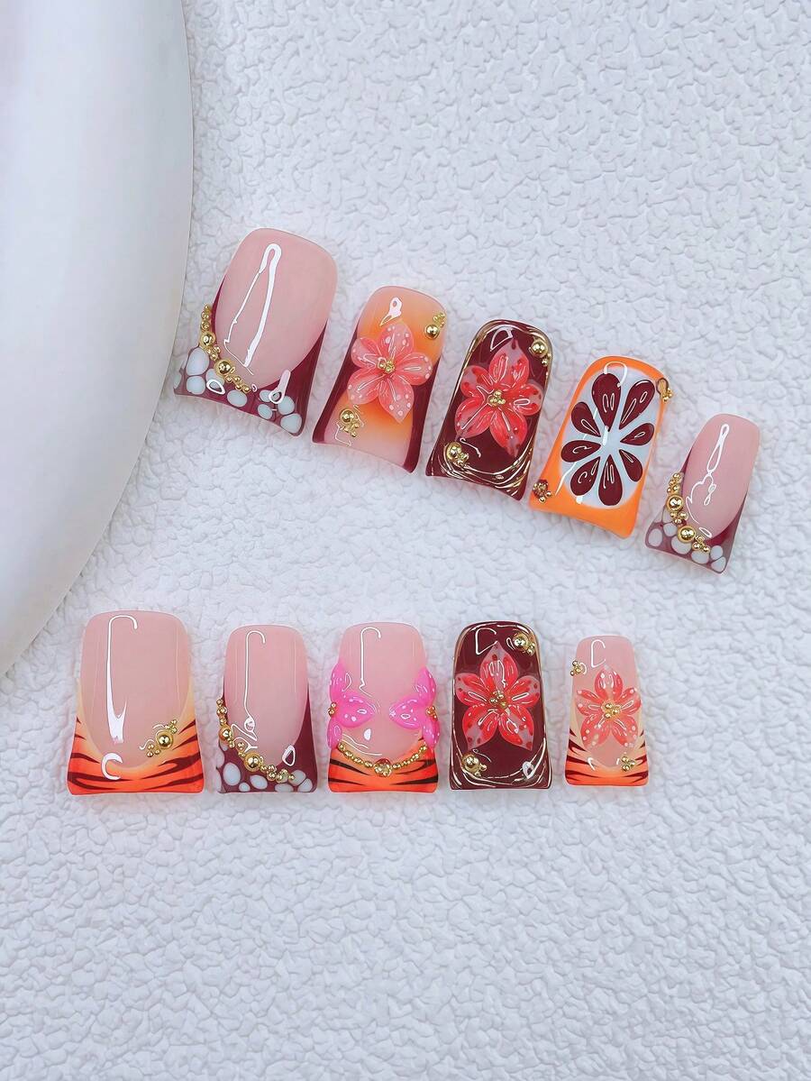 10片装Y2K风鸭嘴美甲贴片套装 - 手工制作，包含粉色、红色、红橙法式美甲贴片、手工3D花朵和3D橙色图案、手绘红色斑马纹和白色波点设计、闪亮金色小钢珠和水钻装饰，精致优雅的美甲 - 完美适用于派对和休闲装扮