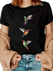 camiseta casual de cuello redondo para mujer con estampado de tres colibríes, con corte regular y tejido de punto ligeramente elástico, adecuado para usar en todas las estaciones. - Negro - Ver 1