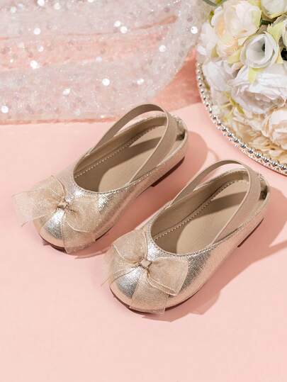 Giày sandal công chúa màu bạc, vàng, hồng có nơ cho bé gái, sandal đế mềm chống trượt mũi kín cho trẻ em, giày dự tiệc cho bé gái.