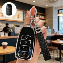 Bao đựng chìa khóa TPU kèm móc khóa da PU, phù hợp với các dòng xe Chery: Tiggo 8 Pro, Tiggo 8 Plus, New Tiggo 5 Plus, Tiggo 7 Pro. Chống bụi và chống rơi, bao đựng chìa khóa thời trang cao cấp và bảo vệ chìa khóa. - A - Xem 2
