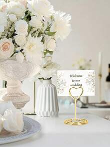 10个金色心形桌号夹 - 心形夹子和支架，可用于固定纸质菜单、照片、桌号卡，以及展示各种收藏品。适用于母亲节、婚礼、生日派对、主题活动、毕业典礼、周年纪念日和单身派对。 - 均碼 - 查看 5