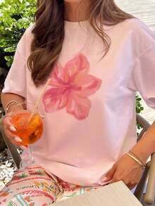Áo thun nữ cổ tròn dáng rộng in họa tiết hoa dâm bụt màu hồng nhạt, thích hợp cho kỳ nghỉ hè ở bãi biển. - Hồng - Xem 1