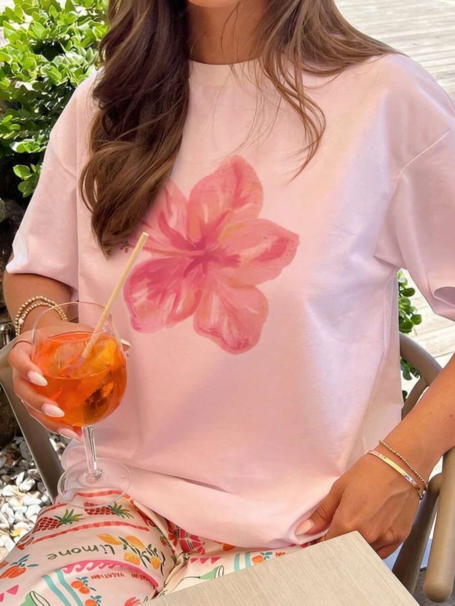 Áo thun nữ cổ tròn dáng rộng in họa tiết hoa dâm bụt màu hồng nhạt, thích hợp cho kỳ nghỉ hè ở bãi biển. - Hồng - Xem 1