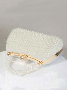 Đây là một chiếc túi xách đính ngọc trai thanh lịch, cao cấp và thời trang, phù hợp cho các dịp như tiệc đính hôn, dạ hội sườn xám và tiệc tối dành cho phụ nữ. Túi ngọc trai thanh lịch, túi xách nữ sang trọng, túi cưới, túi ngọc trai. - Màu be - Xem 5