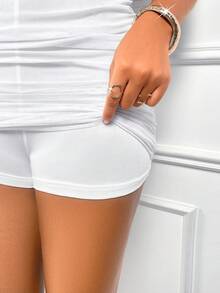 Bộ jumpsuit nữ Amarilo màu trắng mùa hè, cổ yếm, hở lưng, xếp ly, gợi cảm với chất liệu lưới, ôm sát, phù hợp cho kỳ nghỉ biển, tiệc tùng, hẹn hò và mặc hàng ngày, thanh lịch. - trắng - Xem 7