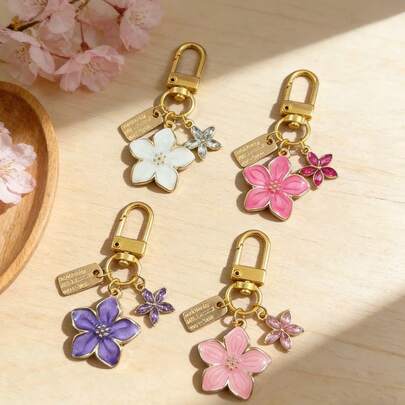 Móc khóa hình hoa anh đào nhẹ nhàng và thanh lịch (1 chiếc/4 chiếc) được làm từ chất liệu hợp kim, được thiết kế đặc biệt dành cho phụ nữ, với hình bông hoa nhỏ 5 cánh và thẻ hình chữ nhật làm phụ kiện trang trí túi xách. Là một phụ kiện du lịch, nó có thể được sử dụng như một phụ kiện trang trí túi xách hoặc móc khóa xe hơi, và cũng là một lựa chọn quà tặng lý tưởng cho bạn bè vào dịp sinh nhật và các ngày lễ.