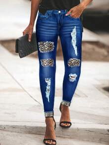 Plus-Size Women's Dark Blue Washed Distressed High-Waisted Slim-Fit Jeans With Ripped Leopard Print Patches And Rolled-Up Cuffs. A Versatile And Retro-Style Casual Trouser. - 藍色 - 查看 5