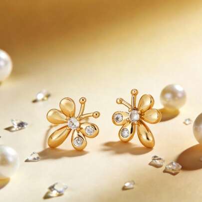 一对优雅精致的极简蝴蝶形锆石耳钉，适合女性日常休闲、通勤和装饰佩戴。