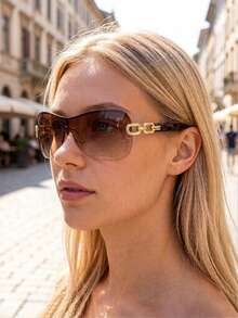 一副Y2K未来主义环绕式时尚眼镜，男士沙滩配饰，适合夏季海滩度假、户外旅行、Y2K音乐节，链条街头Y2K风格超大环绕式镜框，适合音乐节、返校季等场合。 - 棕色 - 查看 4