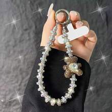 1 chiếc vòng tay hình gấu đính đá pha lê toàn bộ, phụ kiện trang trí cổ tay sang trọng, có dây đeo điện thoại và kẹp điện thoại. - Nhiều màu - Xem 4
