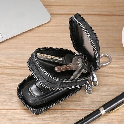 1 chiếc ví đựng chìa khóa xe hơi cao cấp, dày dặn, hai lớp, có khóa kéo, dùng được cho cả nam và nữ, kiểu dáng có gương chiếu hậu, phù hợp với mọi loại xe.