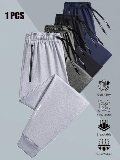男士运动跑步裤，夏季休闲风格，裤脚收口，配有拉链口袋和可调节腰带。适合运动、慢跑和训练。可机洗休闲运动裤，带有字母印花和收口设计。