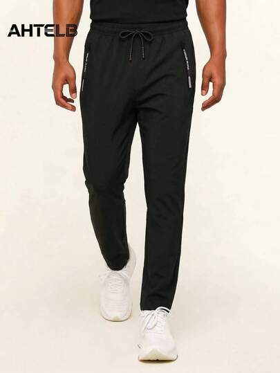  AHTELB Men's Lightweight Ice Silk Breathable Elastic Jogger Pants With Zipper Pockets And Drawstring Waist, Soft And Comfortable Ice Silk Fabric, Solid Color Moisture-Wicking Straight Leg Sweatpants, Suitable For Casual, Outdoor, Workout, Vacation, Fishing, Gym Wear