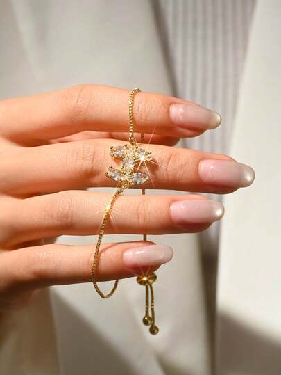 1 chiếc vòng tay mặt dây chuyền sang trọng, tối giản, mạ vàng đồng cao cấp đính đá Cubic Zirconia, thích hợp cho nữ giới đeo hàng ngày.