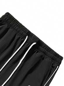 Ougee 男士宽松星形刺绣长裤 | 轻盈透气 | 柔软针织面料 | 撞色滚边和抽绳腰带 | 适合街头服饰、滑板和日常休闲穿着 | Y2K 街头风必备单品 - 黑色 - 查看 4