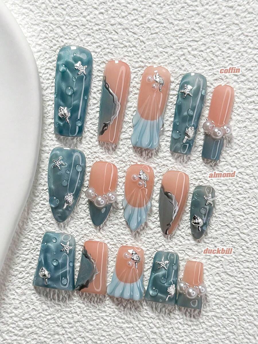 10件套深海奇幻手工美甲套装,包含海星、贝壳、珍珠等海洋元素装饰,搭配蓝色指甲油,打造海洋主题美甲,附赠指甲锉和水晶贴纸,适用于圆形、尖形、方形指甲,可用于派对、日常、摄影、春夏通勤等场合。 - 彩色 - 查看 1