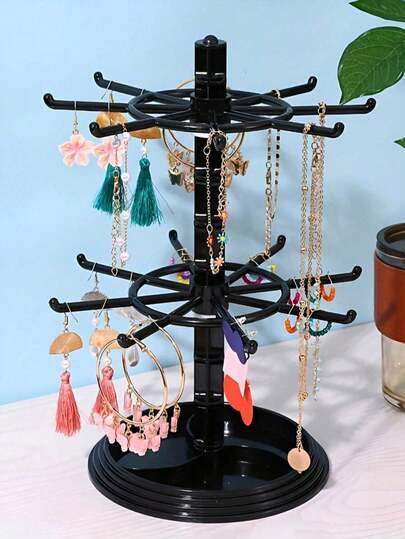 Giá trưng bày trang sức xoay hai tầng trong suốt này phù hợp để trưng bày vòng tay, dây chuyền, mặt dây chuyền, và cũng có thể dùng để đựng các phụ kiện tóc hàng ngày của nữ như kẹp tóc và dây buộc tóc. Kệ đựng đồ màu đen dung tích lớn, thích hợp để trưng bày trên bàn trang điểm, phòng khách, phòng ngủ hoặc quầy hàng. Trang trí phòng