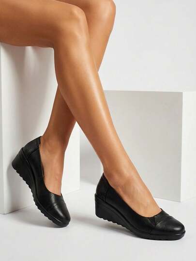 Czółenka damskie na koturnie Snacel