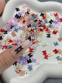 100 peças/300 peças por saco Laços de resina sólida multicoloridos fofos, adequados para arte de unhas DIY e manicure em resina - inodoros, decorações de unhas multifuncionais e usáveis, acessórios de arte de unhas | Encantos de unhas coloridos | Arte de unhas - Multicolorido - Visão 5
