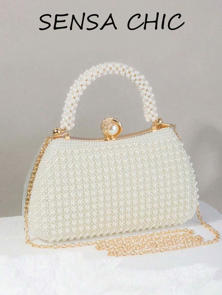 Đây là một chiếc túi xách đính ngọc trai thanh lịch, cao cấp và thời trang, phù hợp cho các dịp như tiệc đính hôn, dạ hội sườn xám và tiệc tối dành cho phụ nữ. Túi ngọc trai thanh lịch, túi xách nữ sang trọng, túi cưới, túi ngọc trai. - Màu be - Xem 1