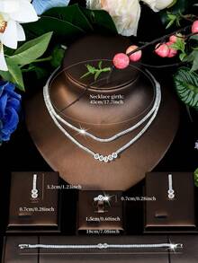 1 Set de joyería con tono plateado, Cubic Zirconia (CZ) Oval Link Layered Choker, conjunto minimalista brillante de collar, aretes, anillo y pulsera a juego para despedidas de soltera, citas nocturnas y brunch de fin de semana - Plateado - Ver 7