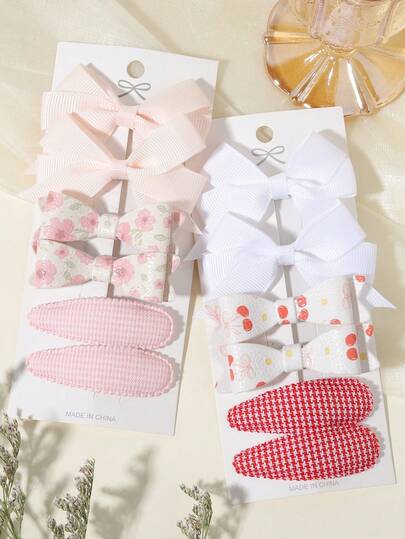 6 chiếc kẹp tóc nơ vải họa tiết hoa và chấm bi, kiểu dáng nữ tính dịu dàng, không gây hư tổn tóc, phù hợp cho cả sử dụng hàng ngày và đi làm.