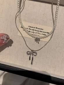 1 chiếc vòng cổ choker nữ kiểu dáng tinh tế, nữ tính, hình nơ rỗng, đính ngọc trai giả và đá rhinestone. - Bạc - Xem 2