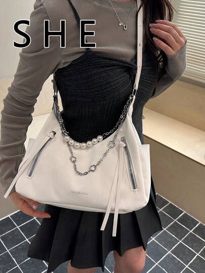 2026 年推出的这款简约、宽敞、时尚且多功能的女士日常通勤斜挎包，采用时尚设计。