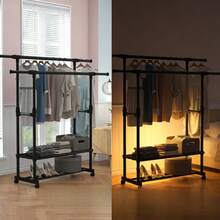 Un appendiabiti doppio indipendente ad alta resistenza con design pieghevole, che include una scarpiera e appendini robusti e durevoli. Questo appendiabiti a strato singolo, che consente di risparmiare spazio, è ideale per camere da letto, balconi e lavanderie. Facile da montare, non richiede attrezzi. - nero - Visualizzare 2