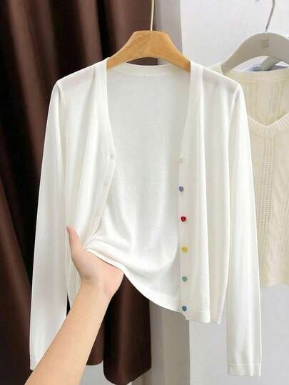 GIGOGOU Cárdigan de punto ligero para mujer, blusa de verano con cuello en V, manga larga, botones con forma de corazón de colores, para vacaciones en la playa, color blanco