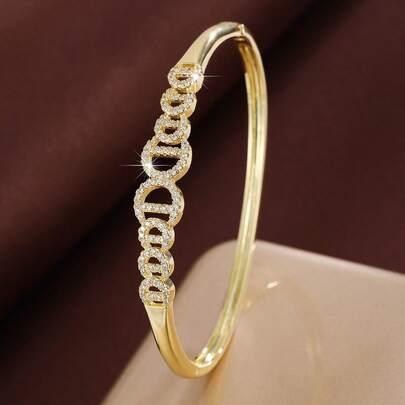 1 chiếc vòng tay nữ thiết kế dây tròn tối giản đính đá Cubic Zirconia.