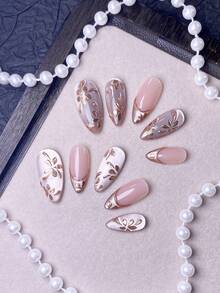 Bộ 10 miếng dán móng tay thủ công, móng giả, móng mùa hè, móng ngắn, miếng dán móng acrylic, bộ dán móng, phong cách Y2K, móng màu nude, móng vàng hồng, hình dán mắt mèo lấp lánh, họa tiết hoa vàng hồng vẽ tay và đầu móng kiểu Pháp màu vàng kim loại. Phong cách sang trọng, thanh lịch, phù hợp cho phụ nữ và các cô gái sử dụng trong đám cưới, tiệc tùng và hẹn hò. - Rượu sâm banh - Xem 4