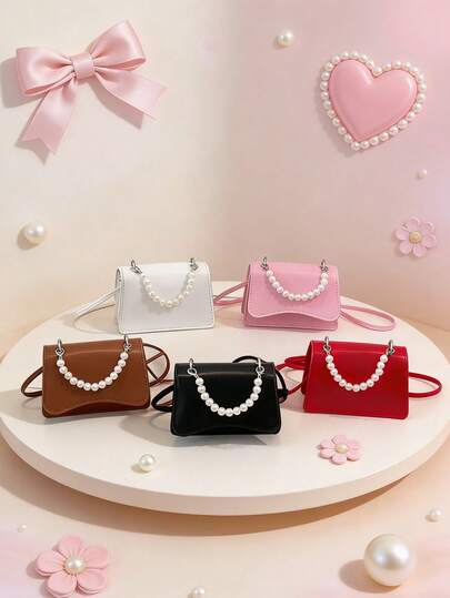 这款时尚纯色迷你珍珠手提包采用独特的肩背/斜挎设计，适合各种场合和多种用途。它非常适合户外活动、玩耍、通勤等，是送给青少年的完美礼物。