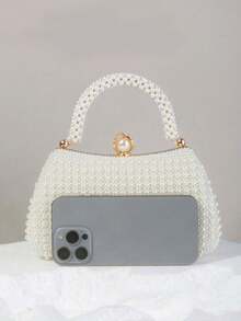Đây là một chiếc túi xách đính ngọc trai thanh lịch, cao cấp và thời trang, phù hợp cho các dịp như tiệc đính hôn, dạ hội sườn xám và tiệc tối dành cho phụ nữ. Túi ngọc trai thanh lịch, túi xách nữ sang trọng, túi cưới, túi ngọc trai. - Màu be - Xem 4